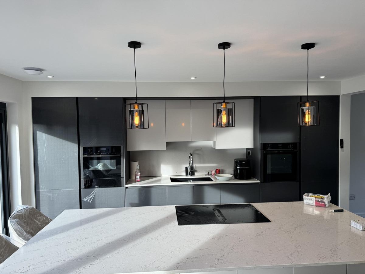 Kitchen with pendant lighting over the island, wired by Advantage Electrical